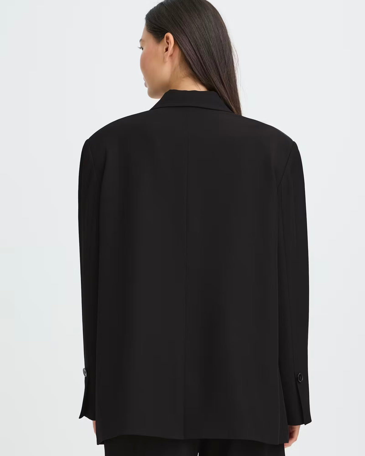 Tailleur nero oversize giacca e pantalone palazzo con elastico in vita