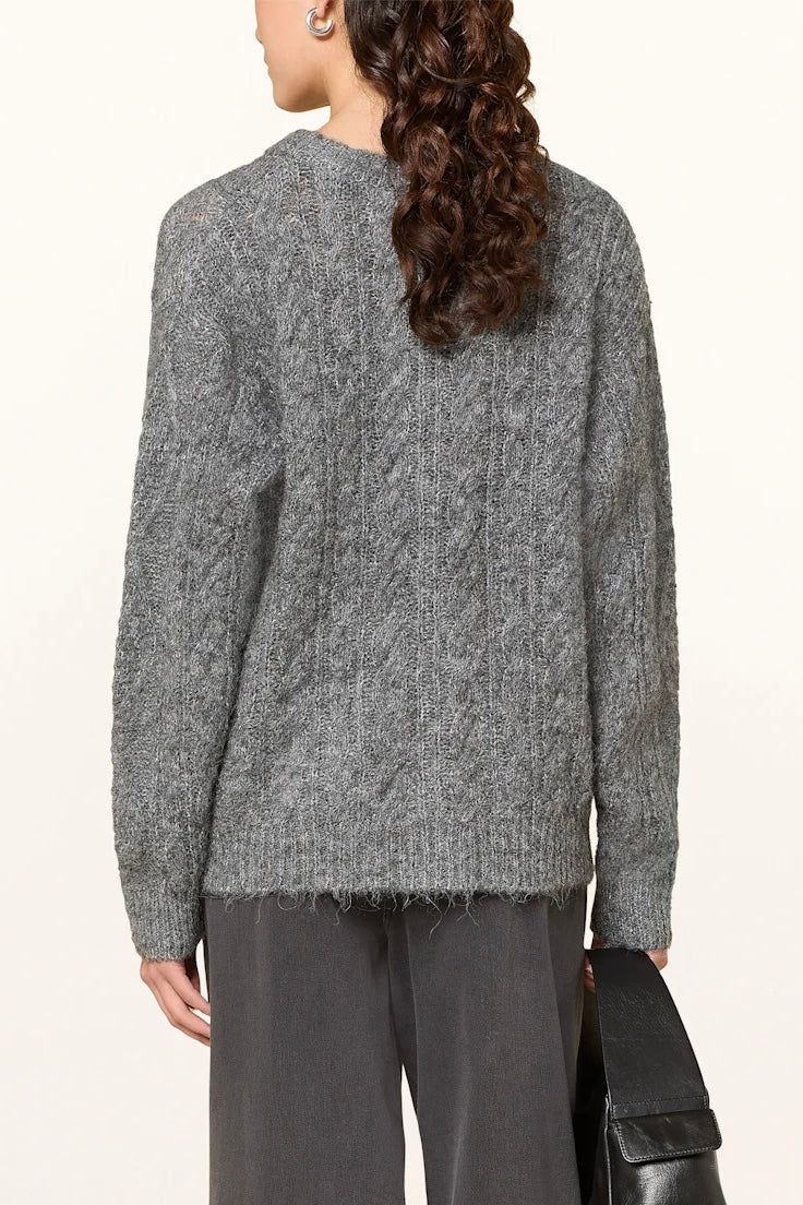 Maglione grigio con con trecce