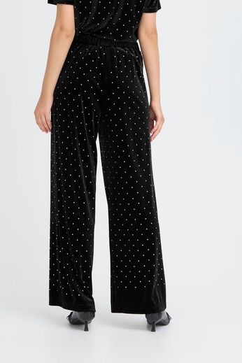 Pantalone nero in velluto con strass