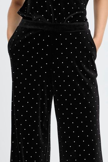 Pantalone nero in velluto con strass