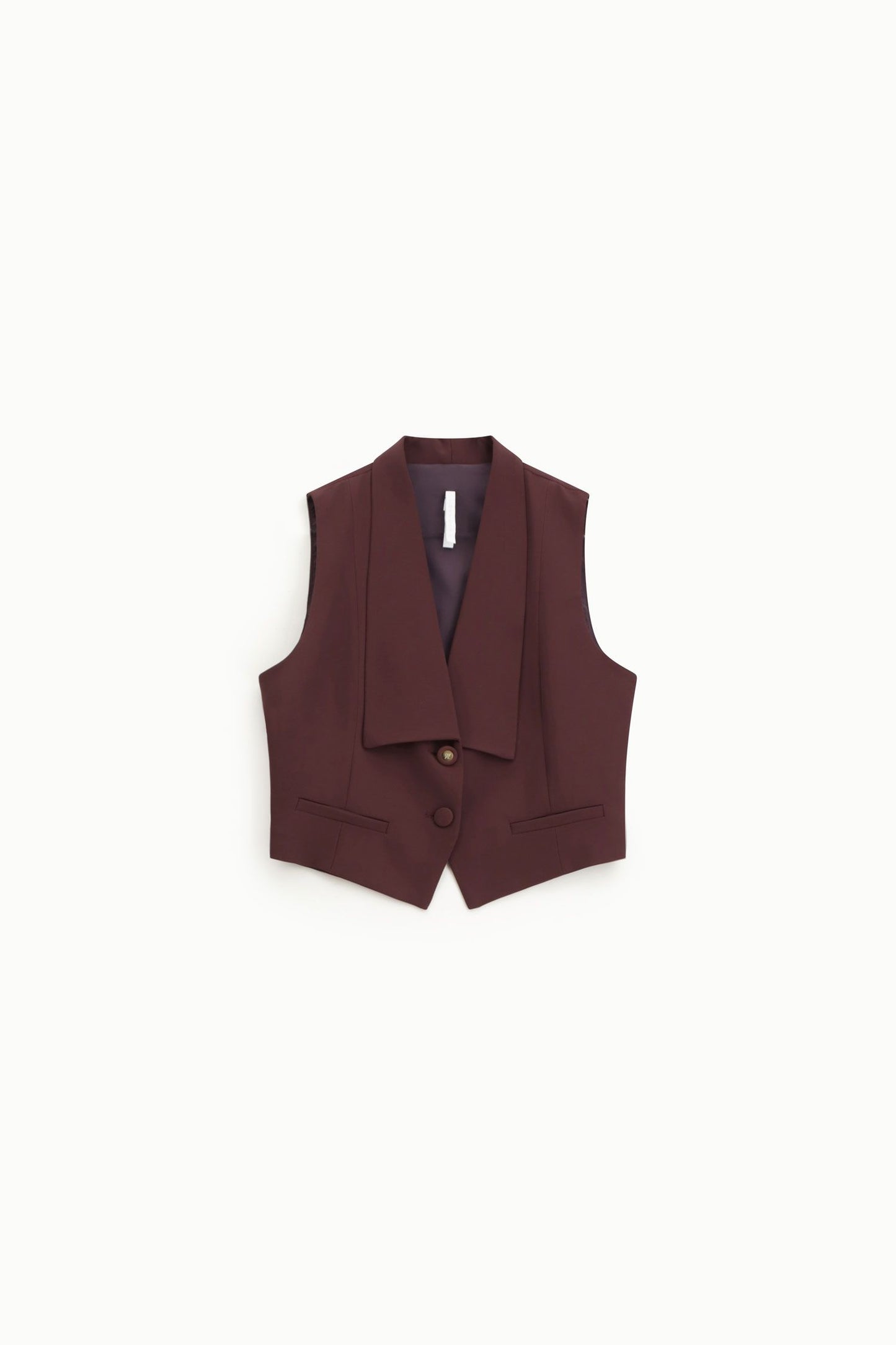 Completo con gilet con bottoni e tasche e pantaloni ampi a vita alta