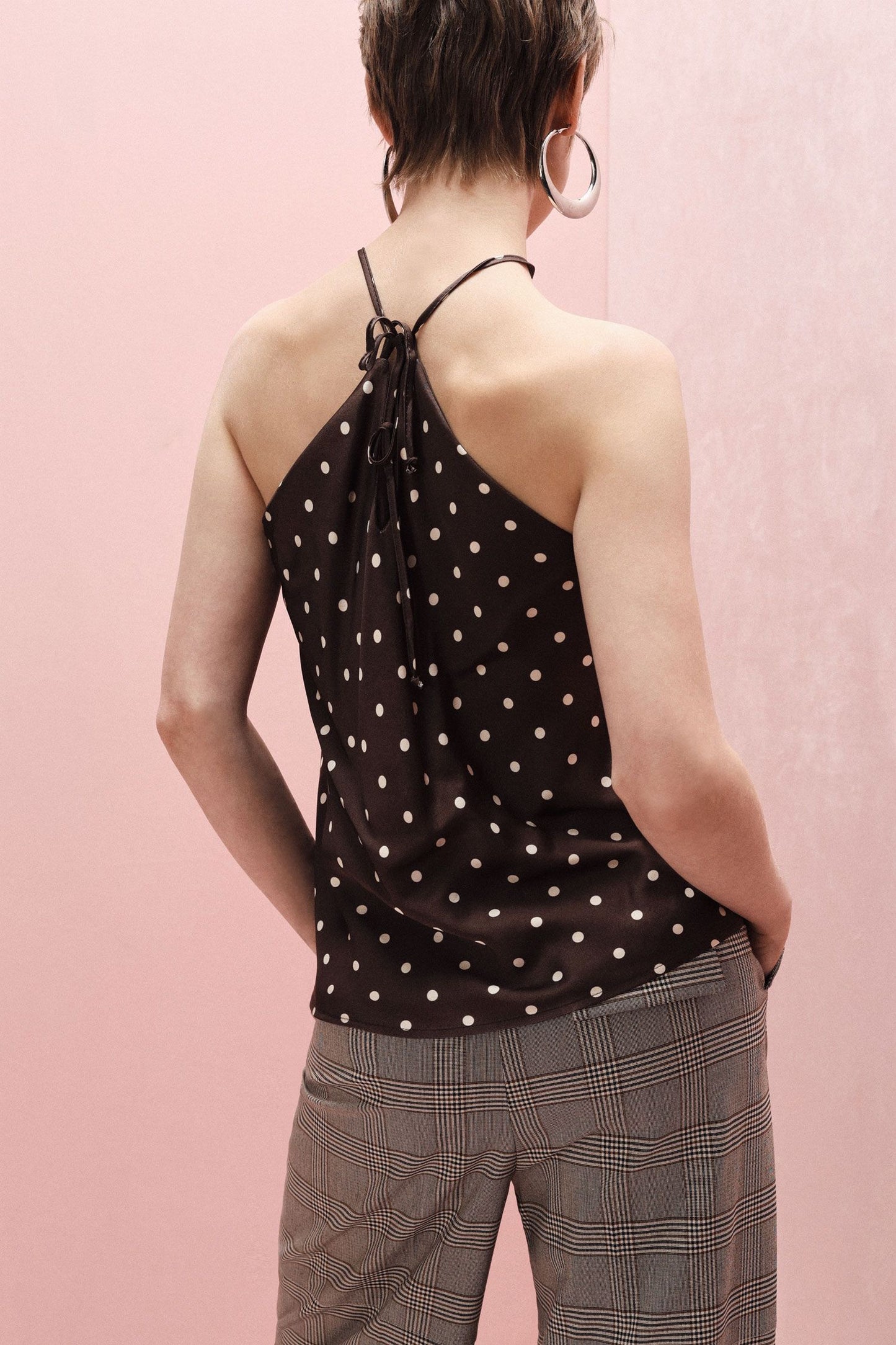 Top moro con spalline sottili, pizzo e pois panna