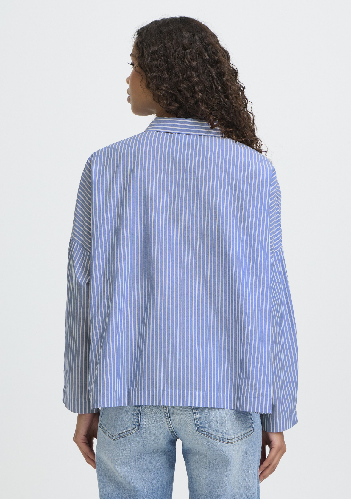 Camicia a righe celeste