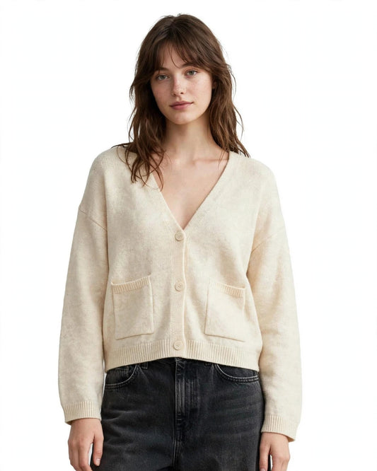 Cream cardigan with buttons and small pockets