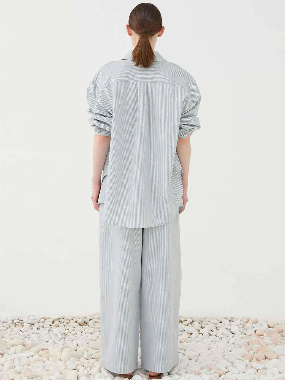 Pantalone palazzo celeste a righe con pareo rimovibile