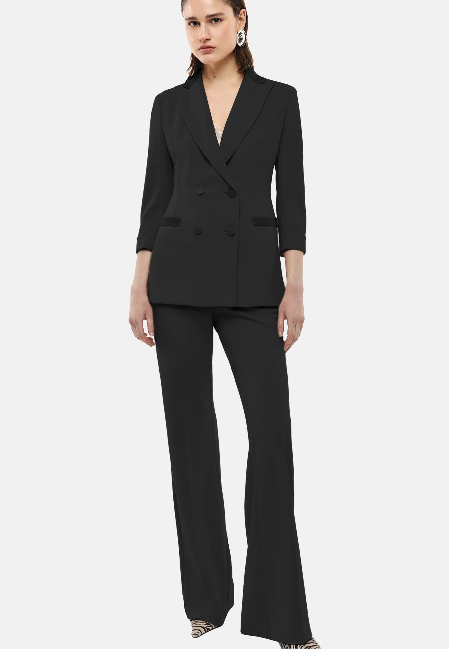 Pantaloni neri flare sartoriali vita alta pinces