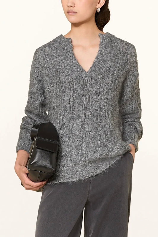 Maglione grigio con con trecce