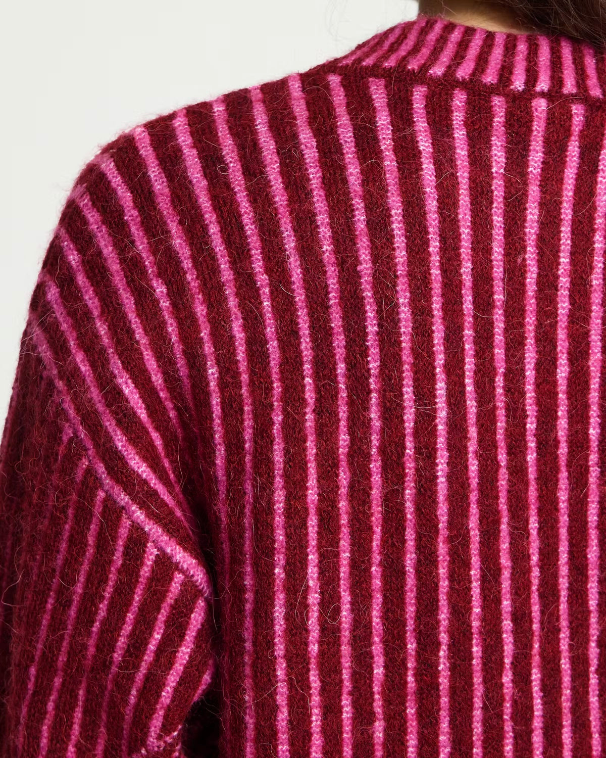 Maglione bicolor bordeaux/fuxia scollatura tonda