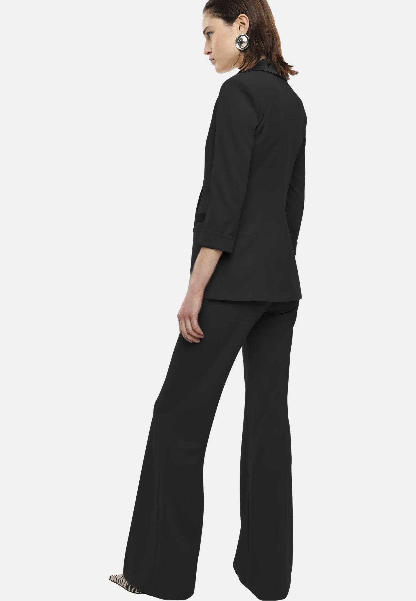 Pantaloni neri flare sartoriali vita alta pinces