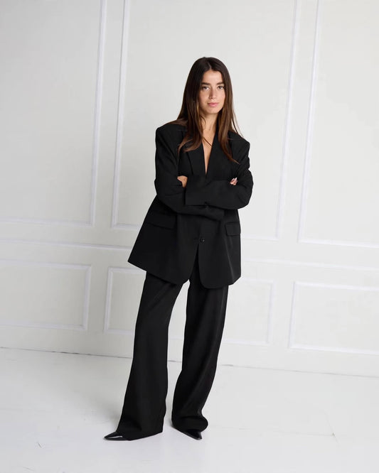 Oversized black suit with jacket and palazzo trousers with elasticated waist