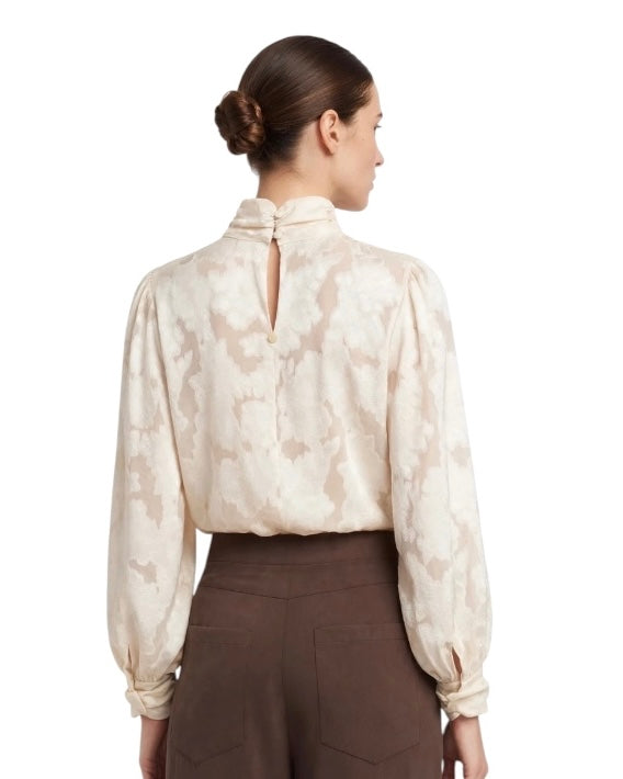 Cream blouse with gathered sleeves and damask effect