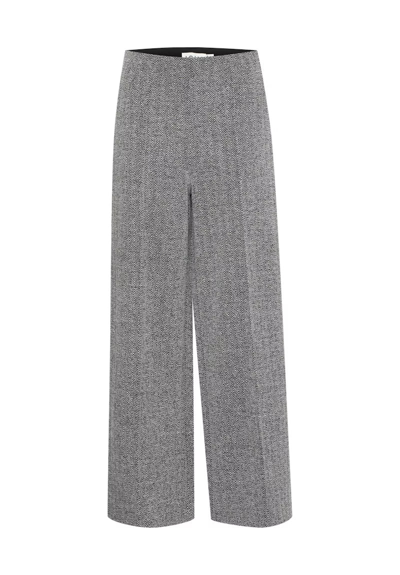 Tailleur spigato con giacca oversize e pantalone palazzo
