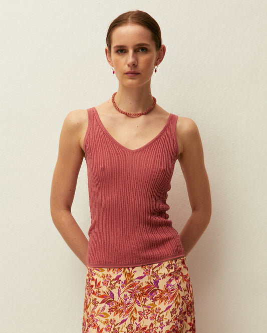 Top corallo con scollo a V e spalline, realizzato in tessuto lavorato a maglia con lurex