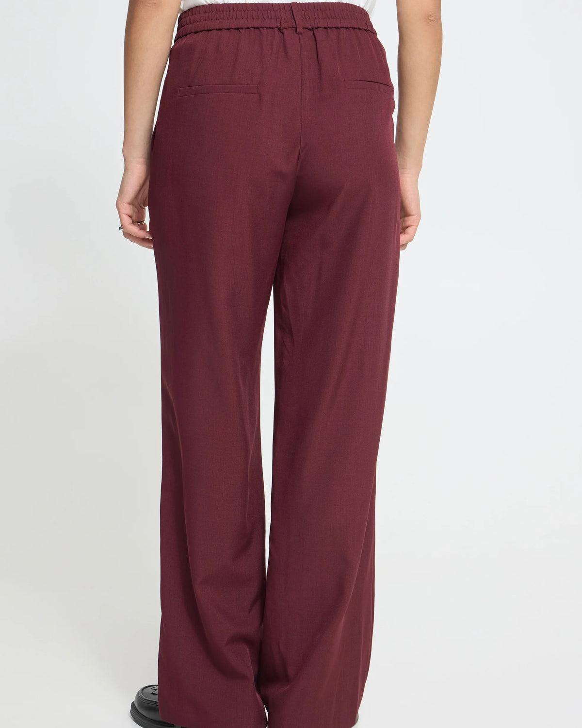 Pantalone bordeaux palazzo con elastico in vita