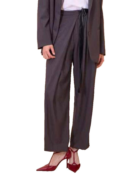Grey palazzo trousers with contrasting faux leather belt