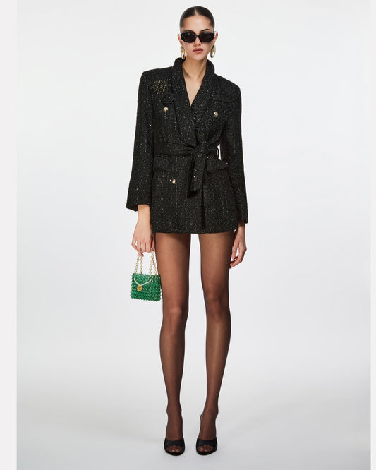 Black tweed jacket with gold micro-sequins, buttons at the cuffs, removable brooches and a belt at the waist