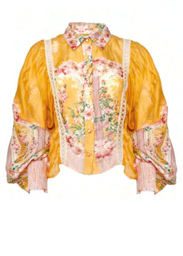 Camicia arancio a fantasia floreale con ricami