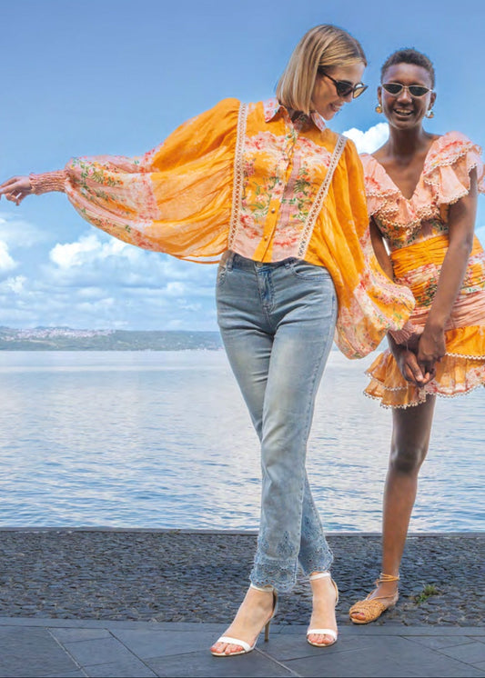 Camicia arancio a fantasia floreale con ricami