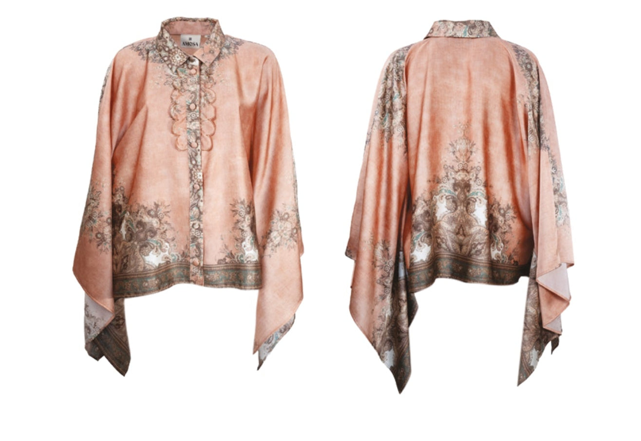 Completo arancio a fantasia floreale con camicia asimmetrica e pantalone palazzo con elastico in vita