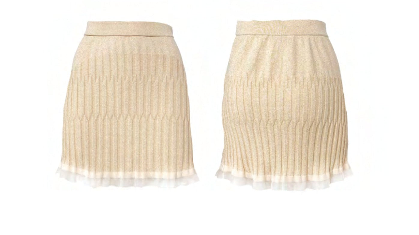 Completo in maglina lurex oro con top e gonna corta