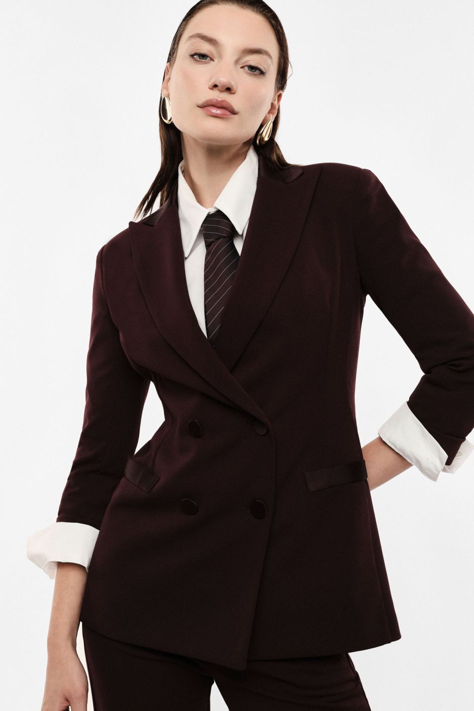 Tailleur plum noir giacca e pantalone a zampa