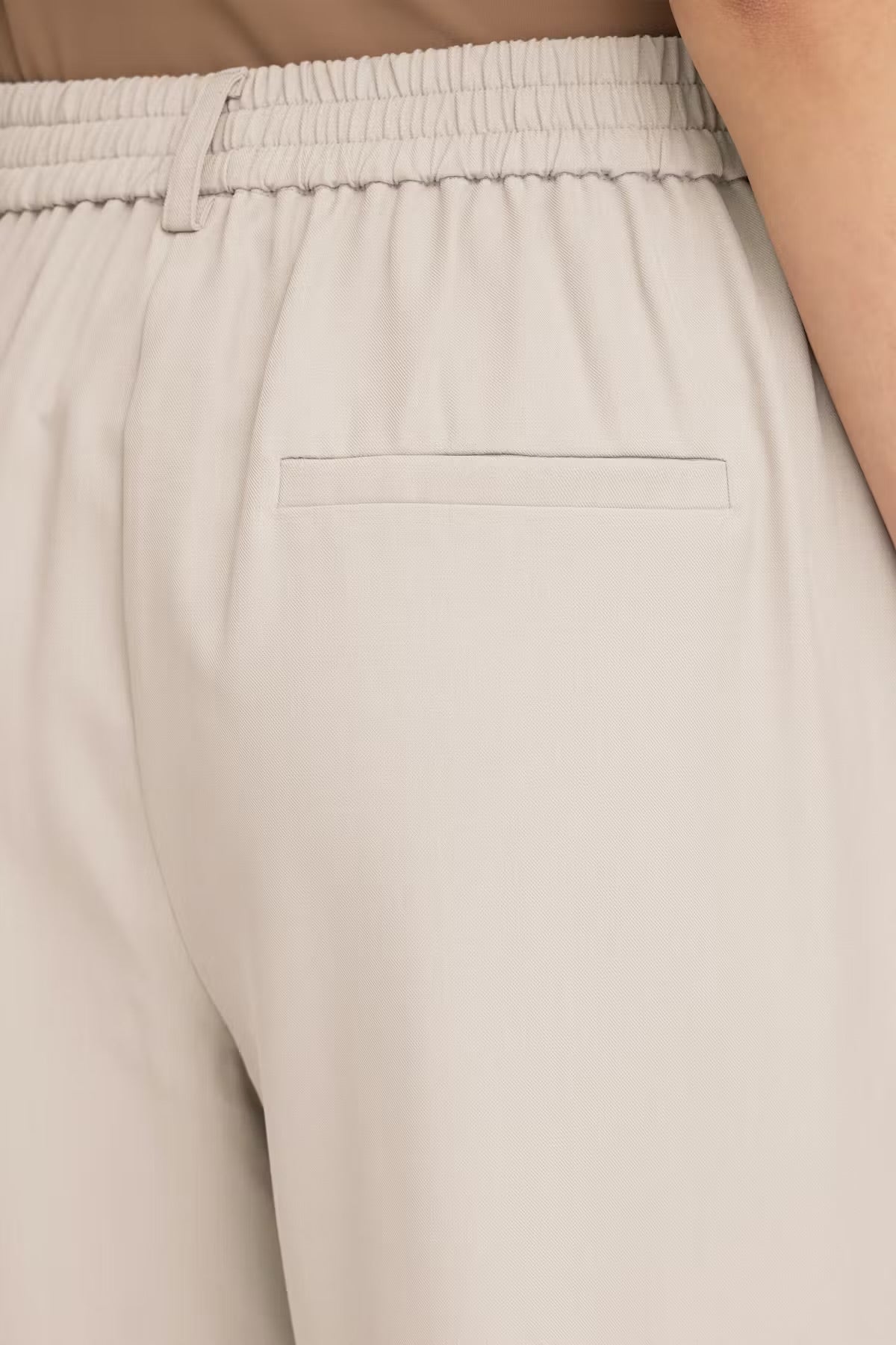 Pantalone palazzo con elastico in vita beige