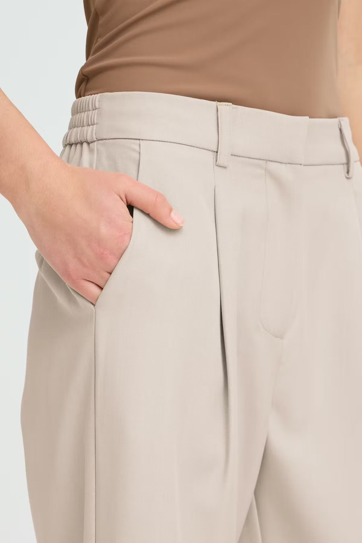 Pantalone palazzo con elastico in vita beige