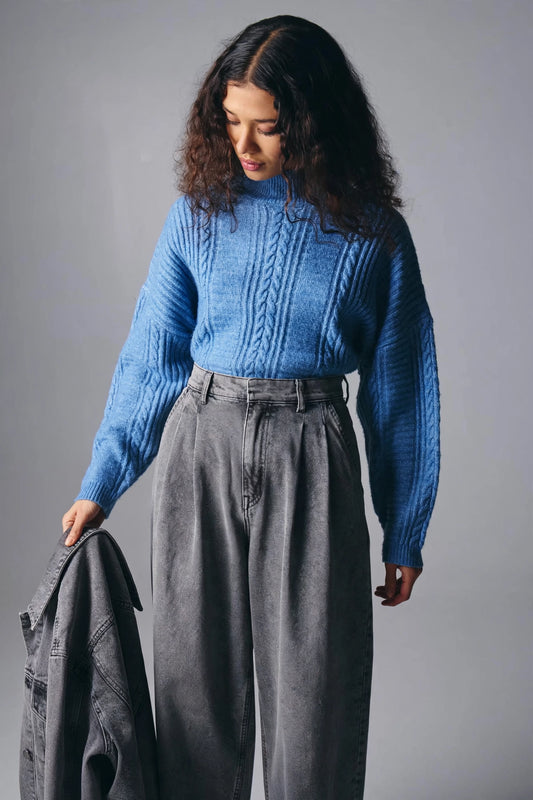 Light blue turtleneck sweater with embroidery