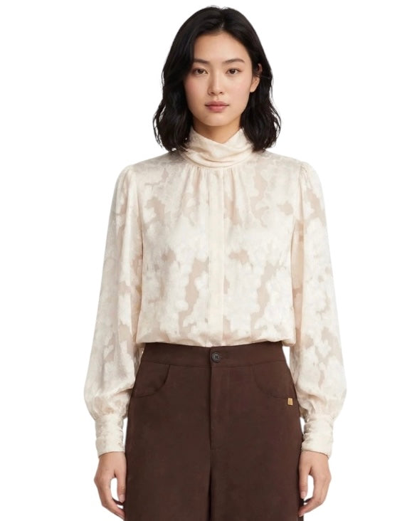 Cream blouse with gathered sleeves and damask effect