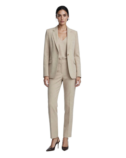 Cream suit with single-breasted jacket and cigarette trousers