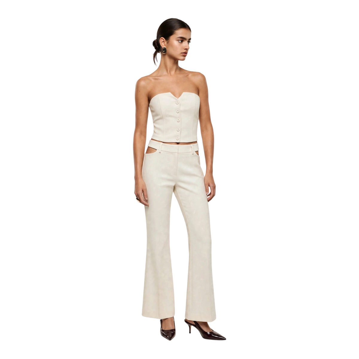 Completo marmo top decolté con bottoni e pantalone a zampa con aperture laterali in vita