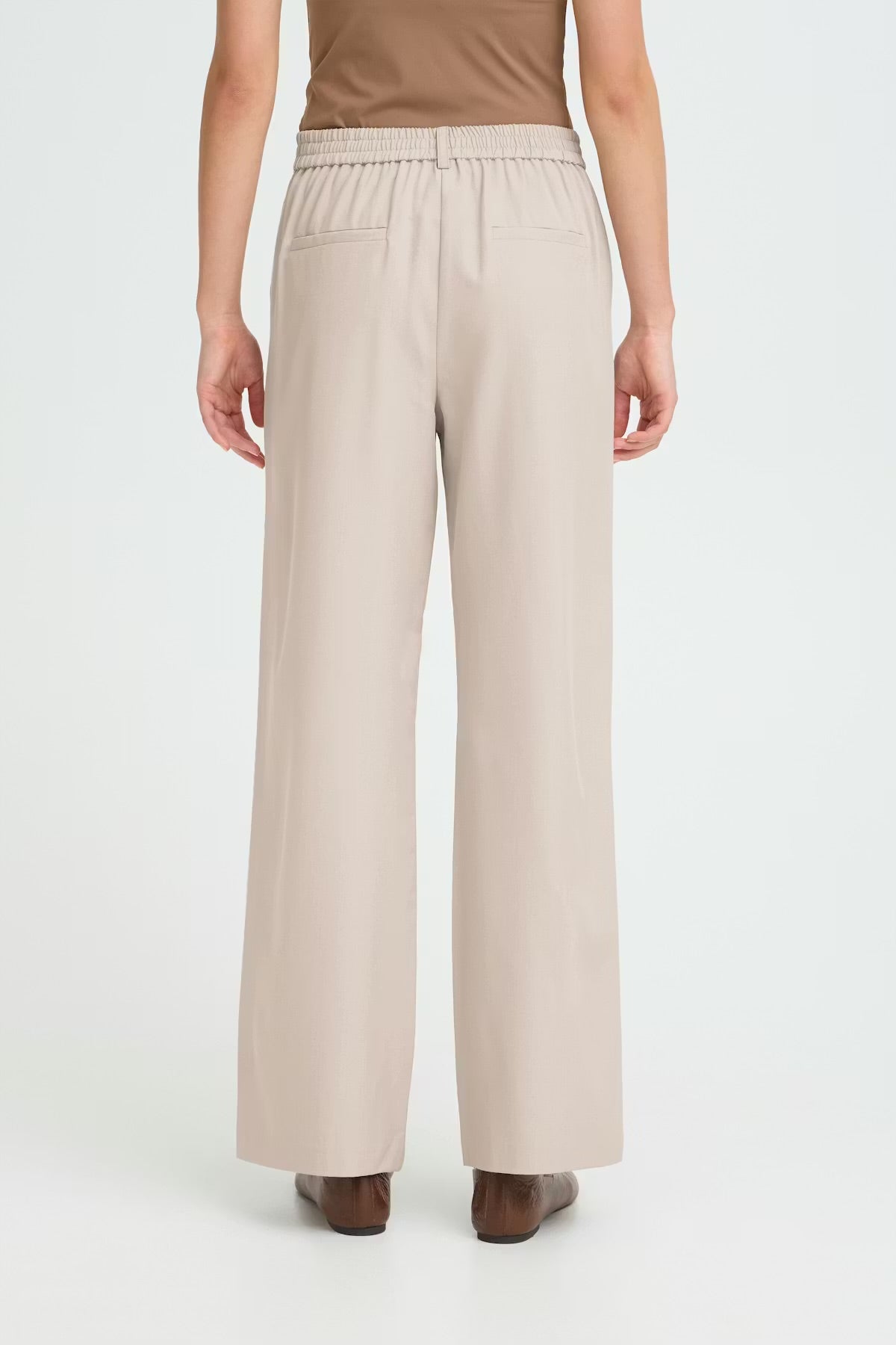 Pantalone palazzo con elastico in vita beige