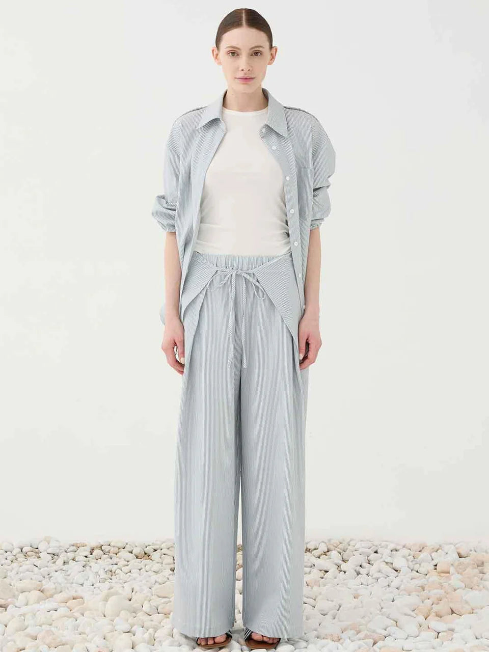 Pantalone palazzo celeste a righe con pareo rimovibile