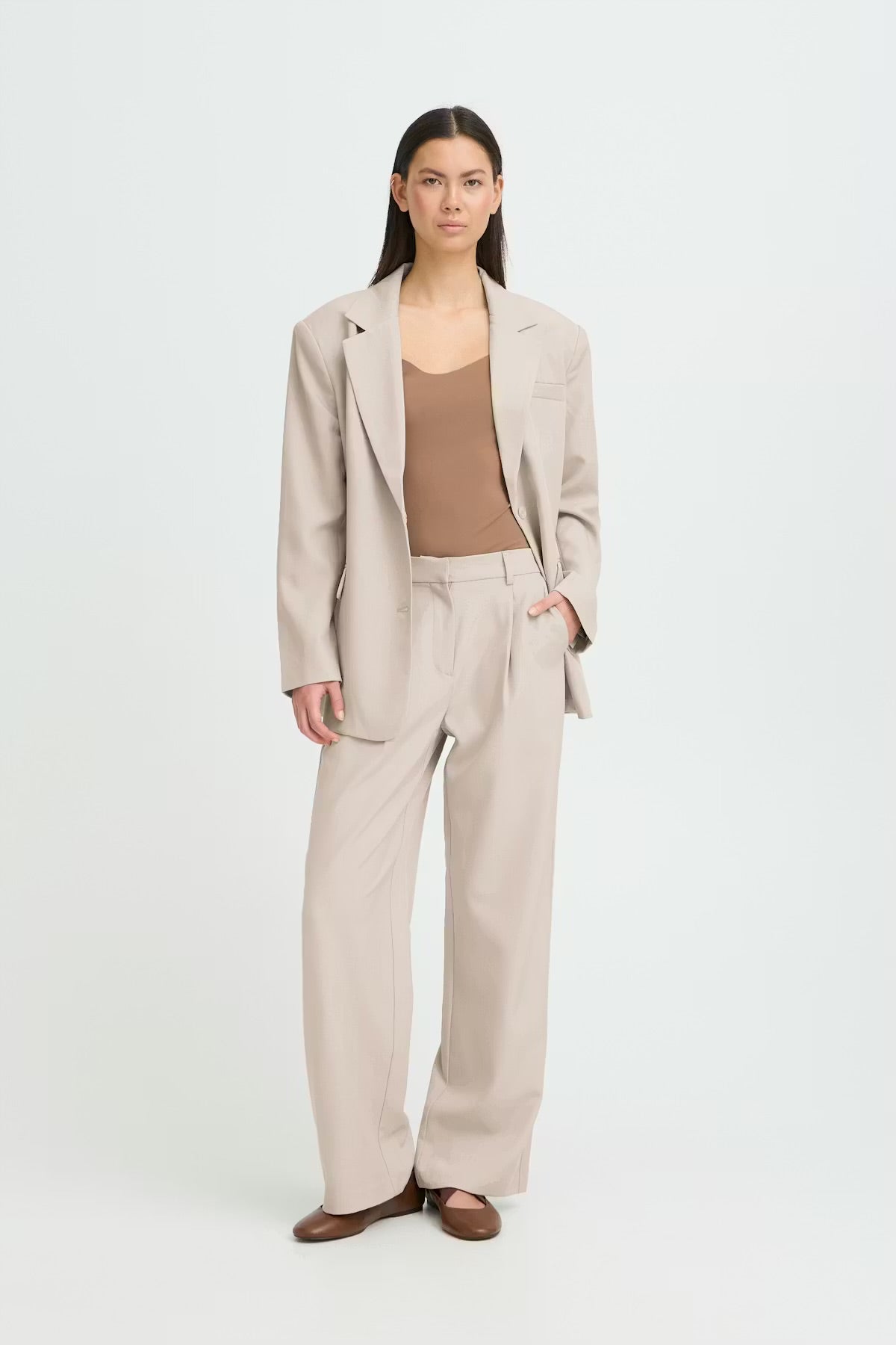 Pantalone palazzo con elastico in vita beige