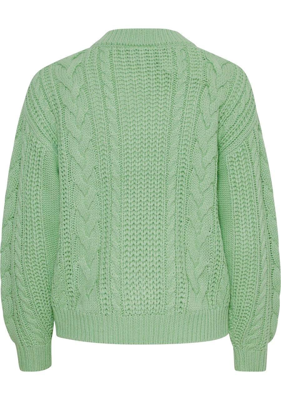 Cardigan in maglia verde con trecce