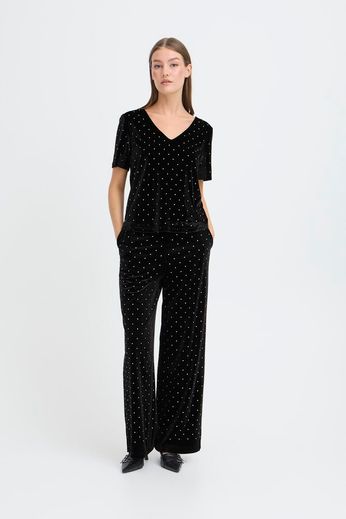 Pantalone nero in velluto con strass