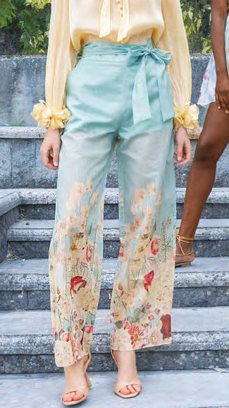 Pantalone a palazzo celeste a fantasia floreale e cintura in vita